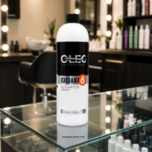 بطری اکسیدان 6 درصد CHEG Professional حجم 1000 میلی‌لیتر روی ویترین شیشه‌ای آرایشگاه