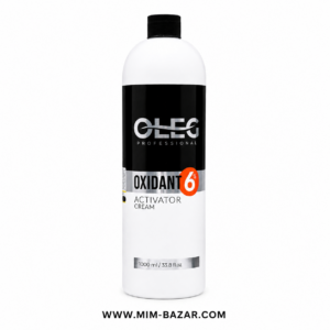بطری اکسیدان 6 درصد CHEG Professional حجم 1000 میلی‌لیتر روی ویترین شیشه‌ای آرایشگاه